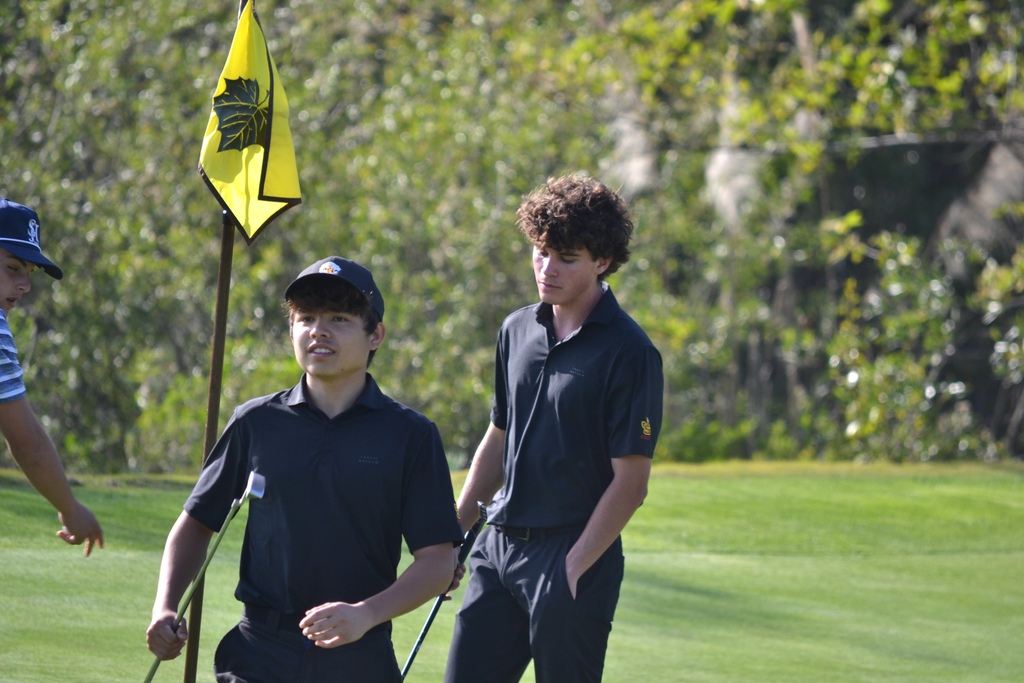 Kaikoa and Jacob finishing up on hole 5