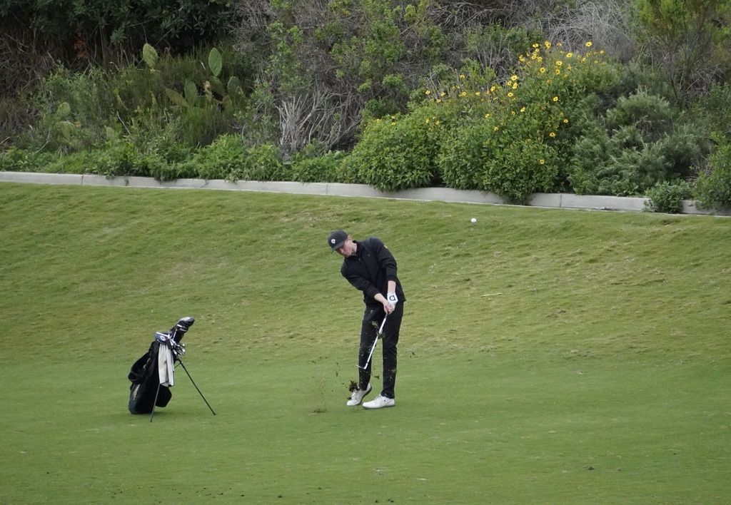Gavin Heller with his approach shot into the green of hole 6.