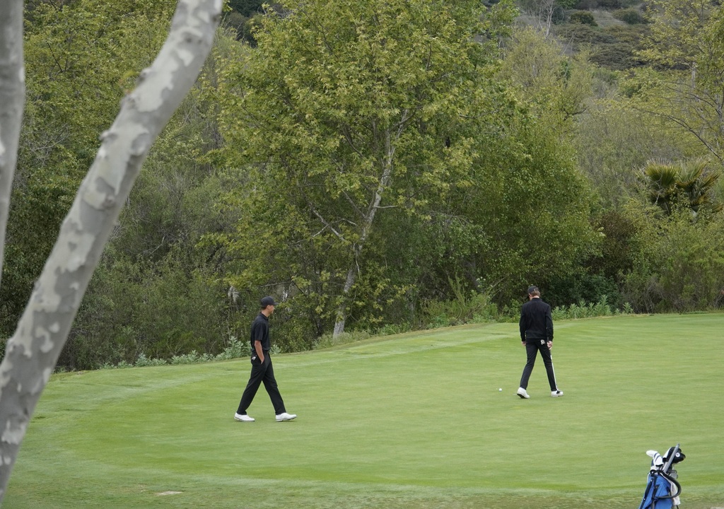 Hollan and Gianni on the putting green.
