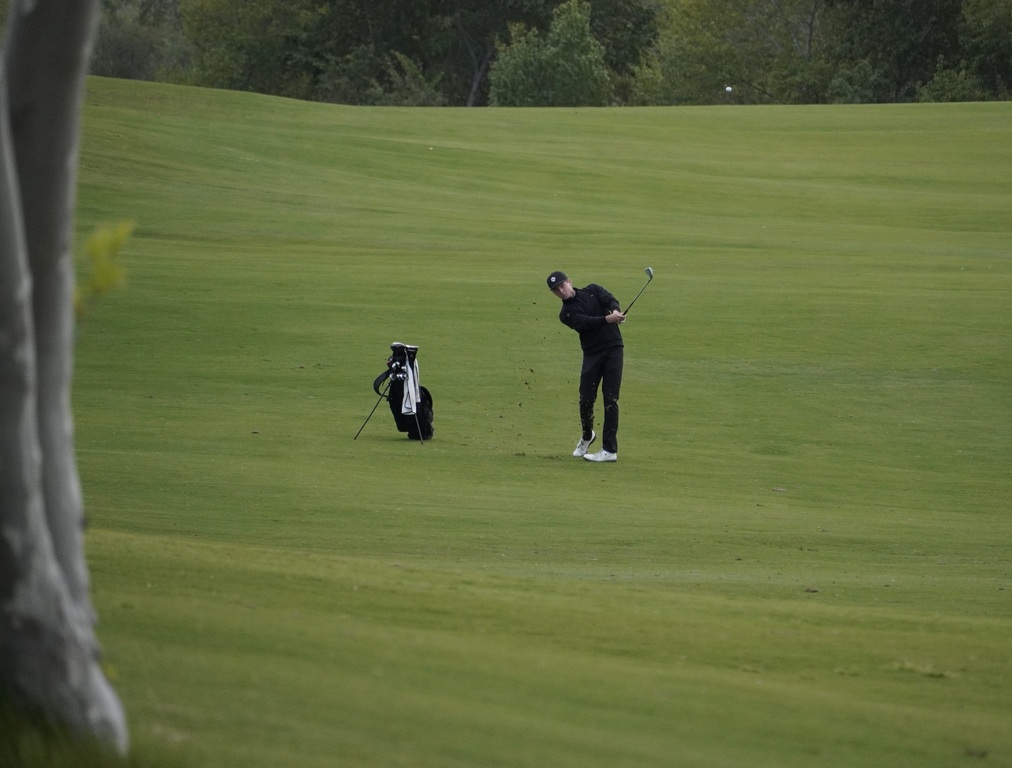 Gavin Heller with his approach shot into the green of hole 3.  Gavin finished the hole with a par.