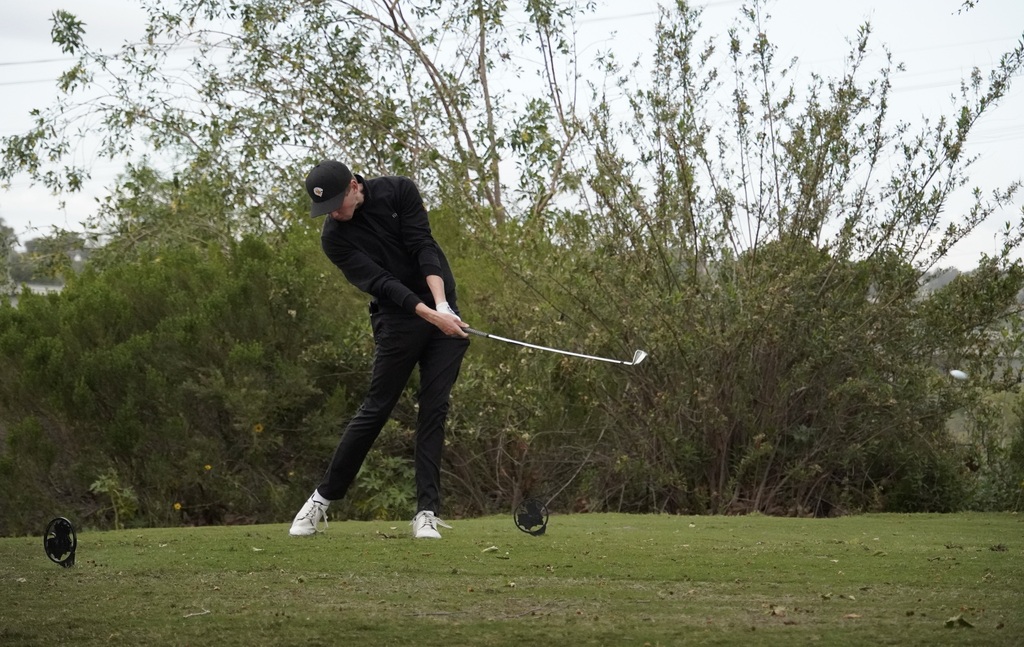 Gavin Heller with his tee shot on hole 6.