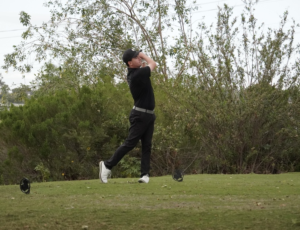 Liam McNamara with his tee shot on hole 6.  Liam finished the hole with a par.