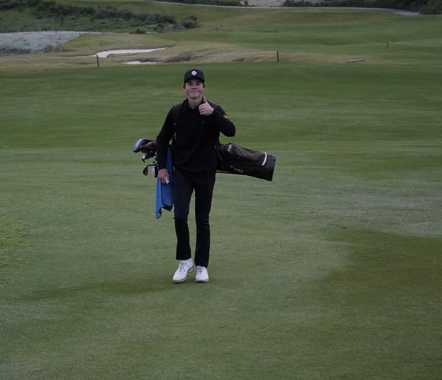 Gianni finishing up his round with smiles and a thumbs up.  Gianni finished his round with a low score of 37.