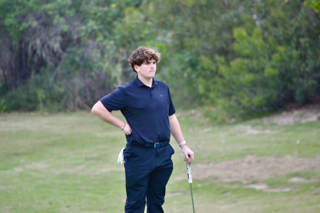 Louie is studying how to play his next shot.