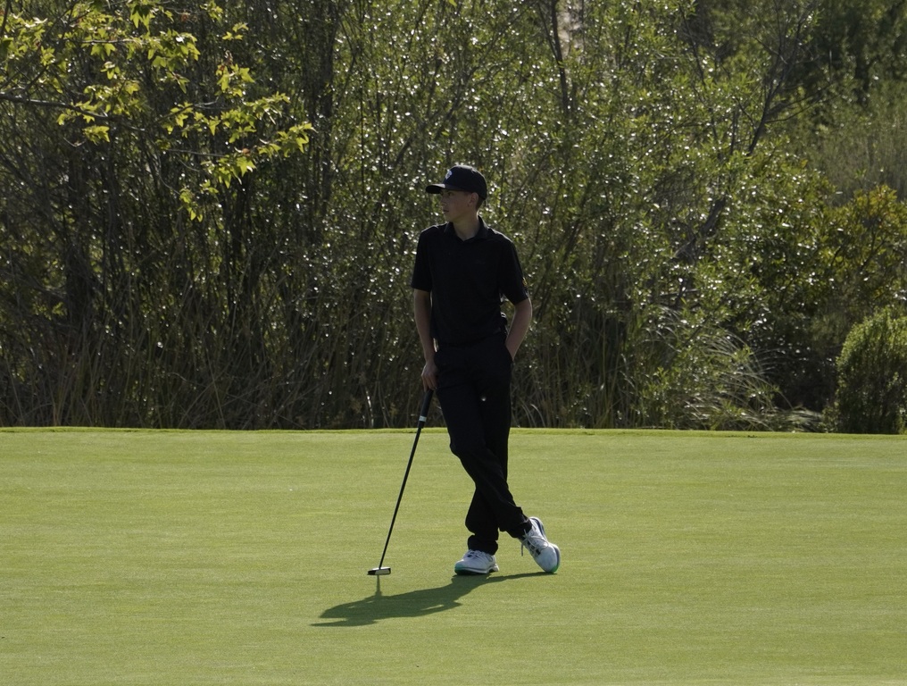 Jase on the putting green of hole 3.