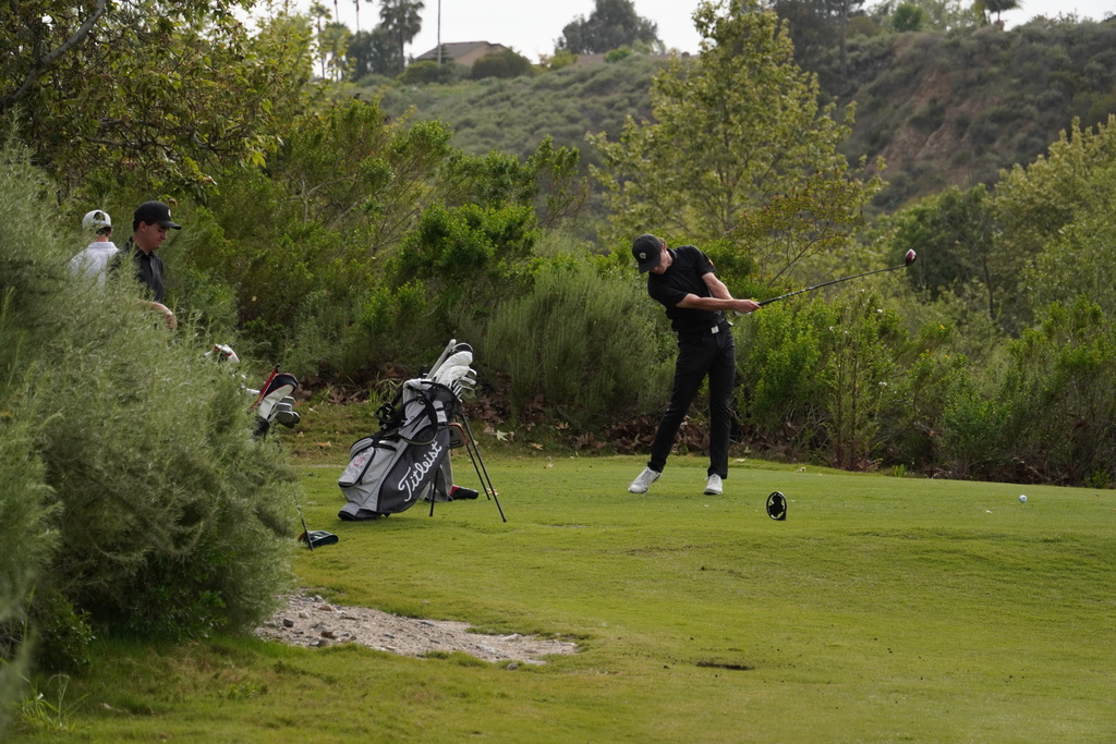 Adam Rusin on the tee box of hole 3.