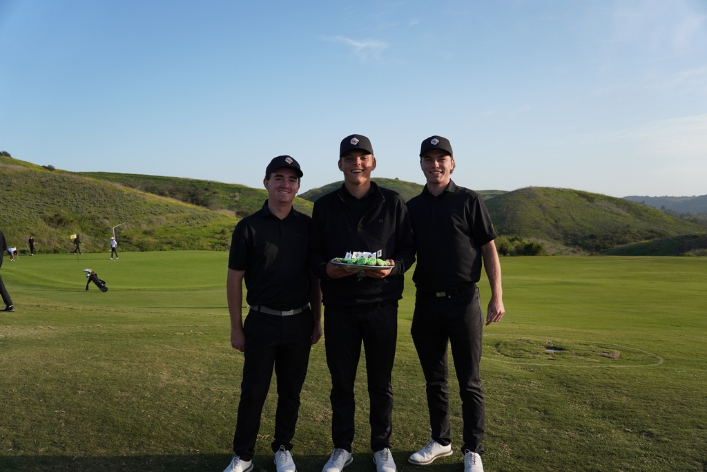 The seniors (Liam, Finn, and Adam) celebrating the final home match with cupcakes made by Liam's mom.