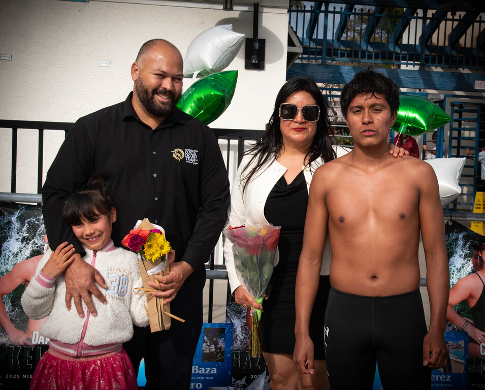 Senior night photo of Alberto and his family