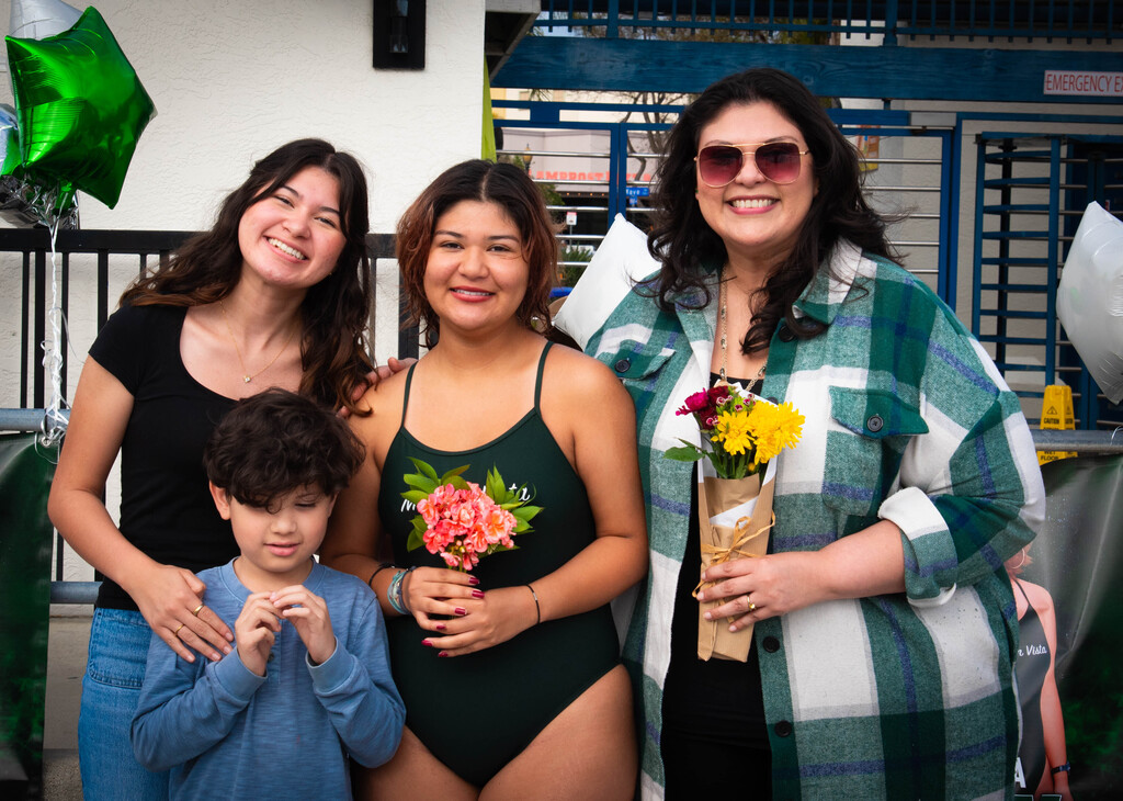 Senior night photo of Cesia with her family