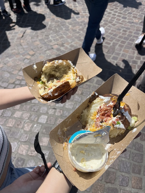 baked potato at disneyland with senior besties