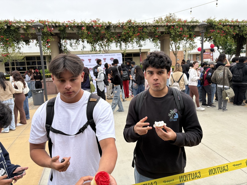 Two delegates enjoying a snack on college decision day!!