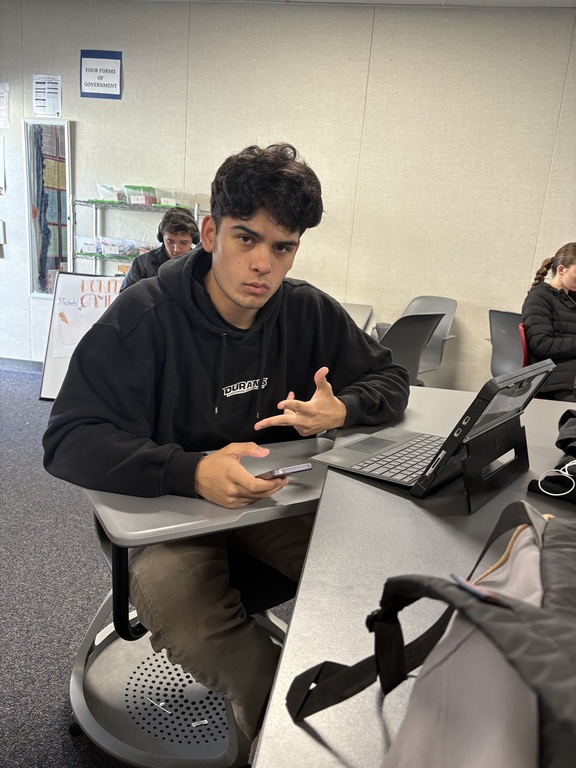 Ivan Duran working hard on Xplore capstone slideshow!