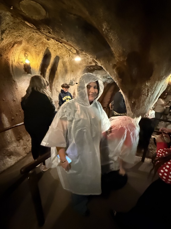MUN at Disney. My capstone leader wearing a poncho 🤭 #poncho #Disney #MUN #Capstone