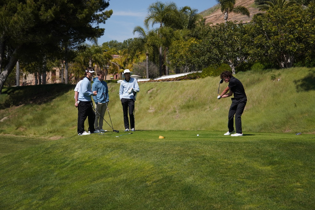 Jacob on the first tee at the Senior Day Golf Match/Party.