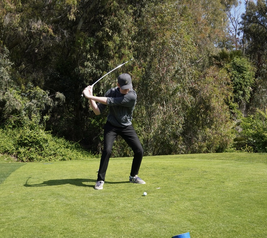 Charlie teeing with opening tee shot at the Senior Scramble.