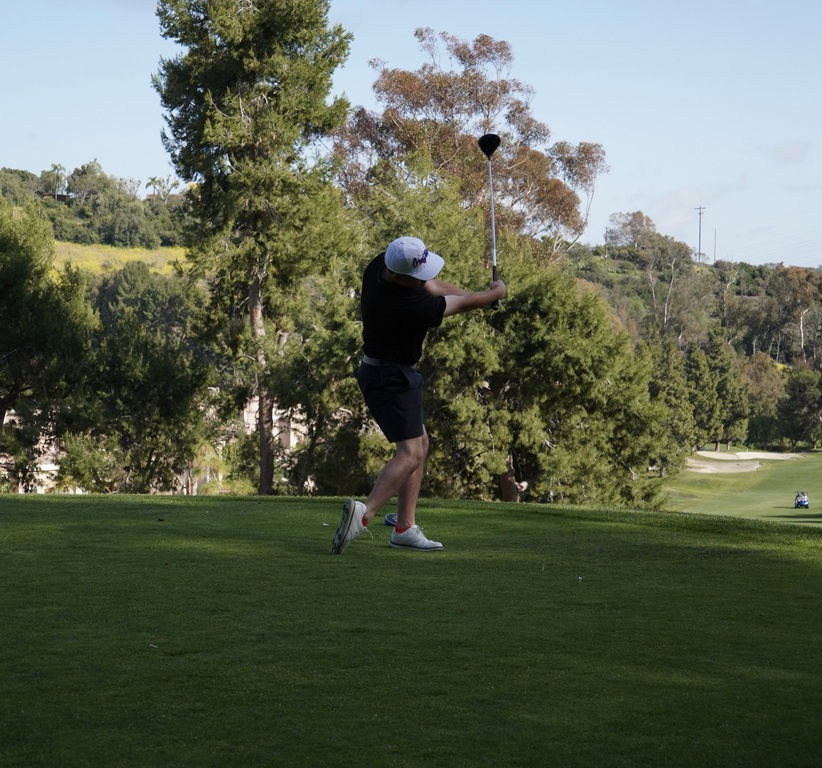 Liam teeing off on hole 4.