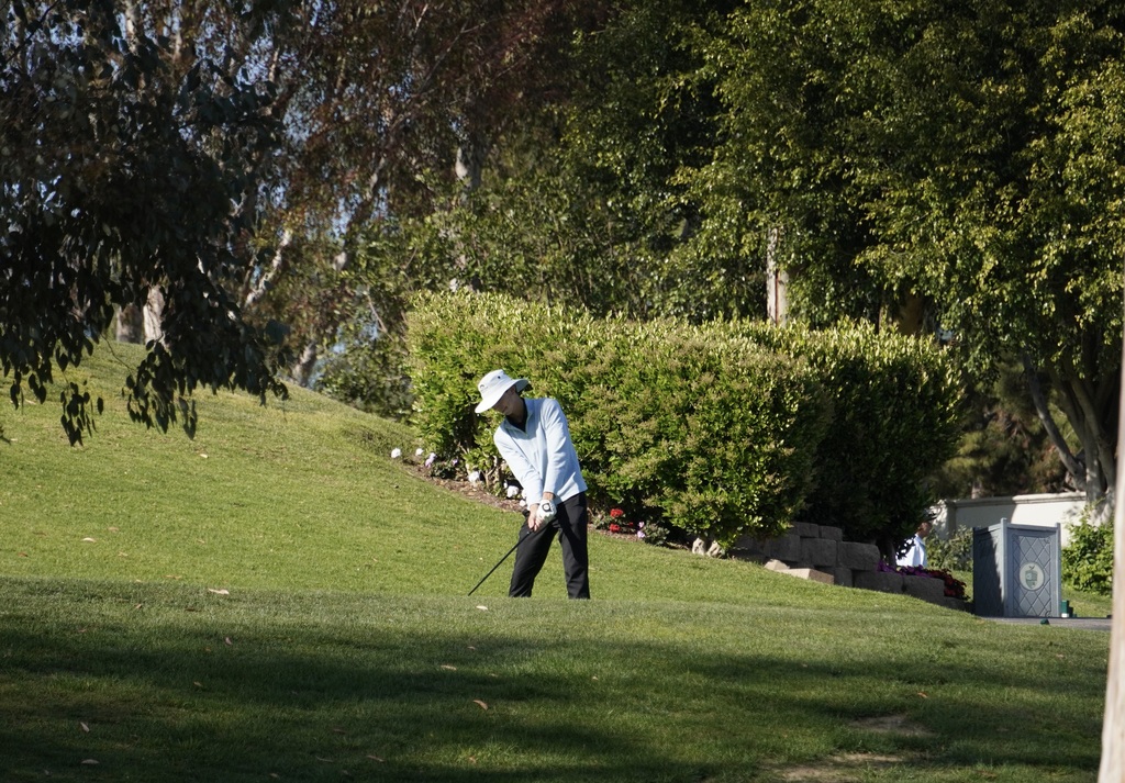 Grayson teeing of on hole 9 at the Senior Scramble.