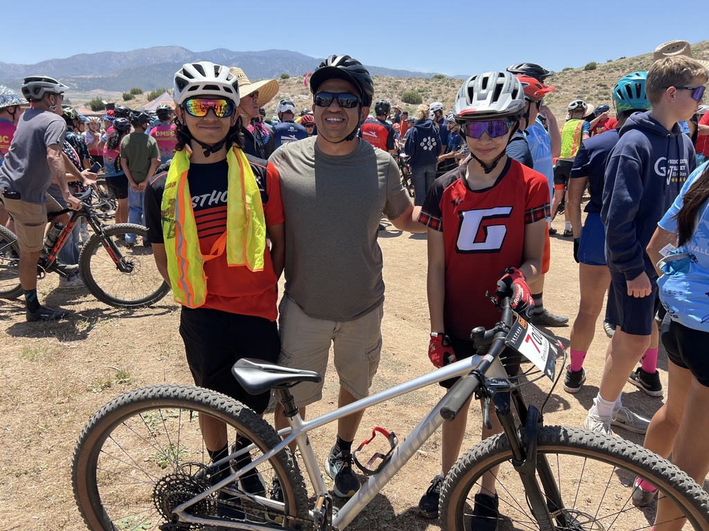 Max, coach Jorge, and Danika Getting ready for Championship relay race!