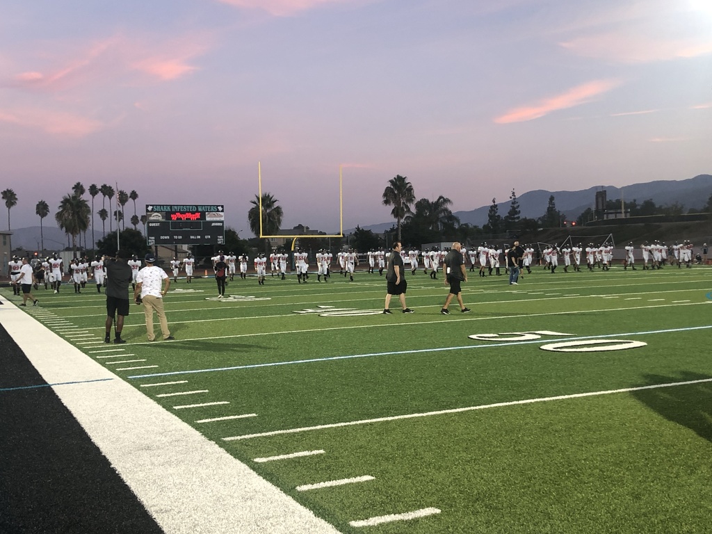 Centennial football warming up for the Battle of Rimpau