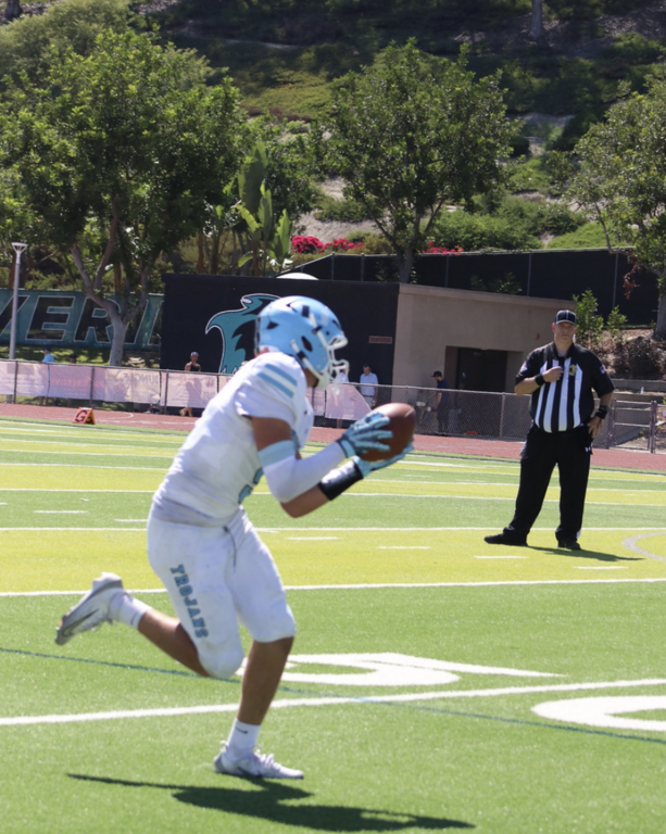 #9 Tight End Lucca Clouthier snatches the catch and turns upfield for the Trojans