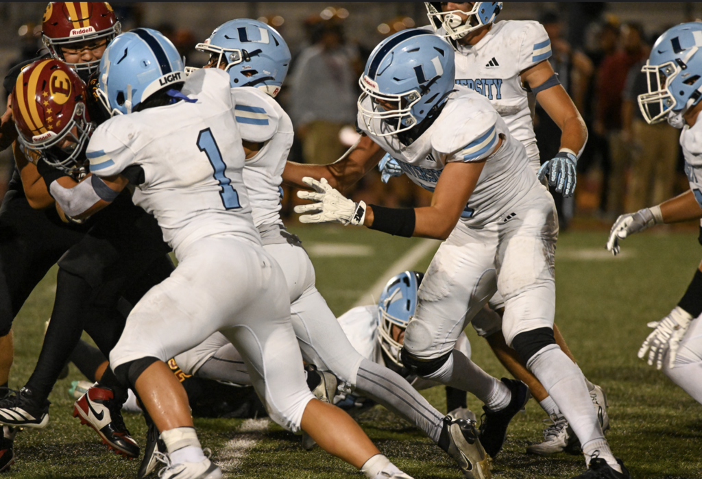 #1 Marco Pablo Tirado with the Trojan tackle