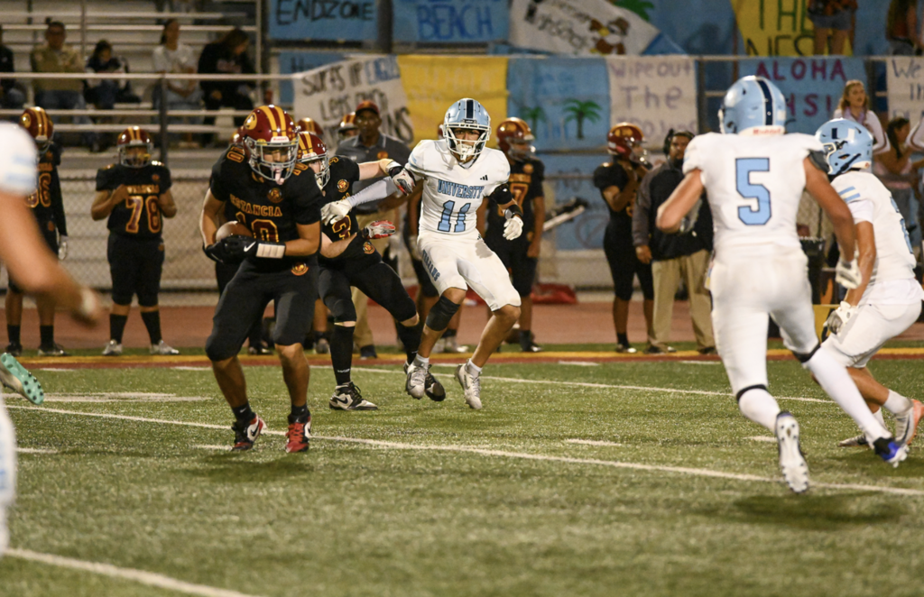 #5 Senior Captain Luke Emrich locks down on the Estancia receiver to bring down