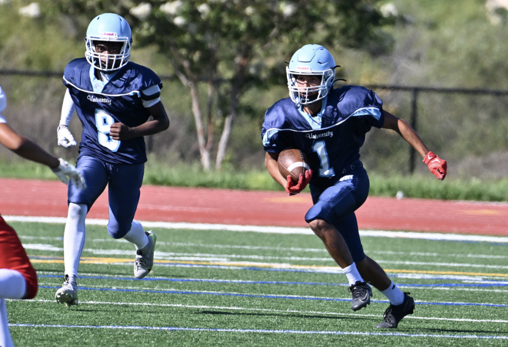 #1 Muqtader Ahmadi bursts through for a big gain in the Frosh Trojans victory over Corona.    For more great Frosh pictures, please visit https://unifootballboosters.smugmug.com/20252026-UNI-TROJANS-FOOTBALL/2025FROSH