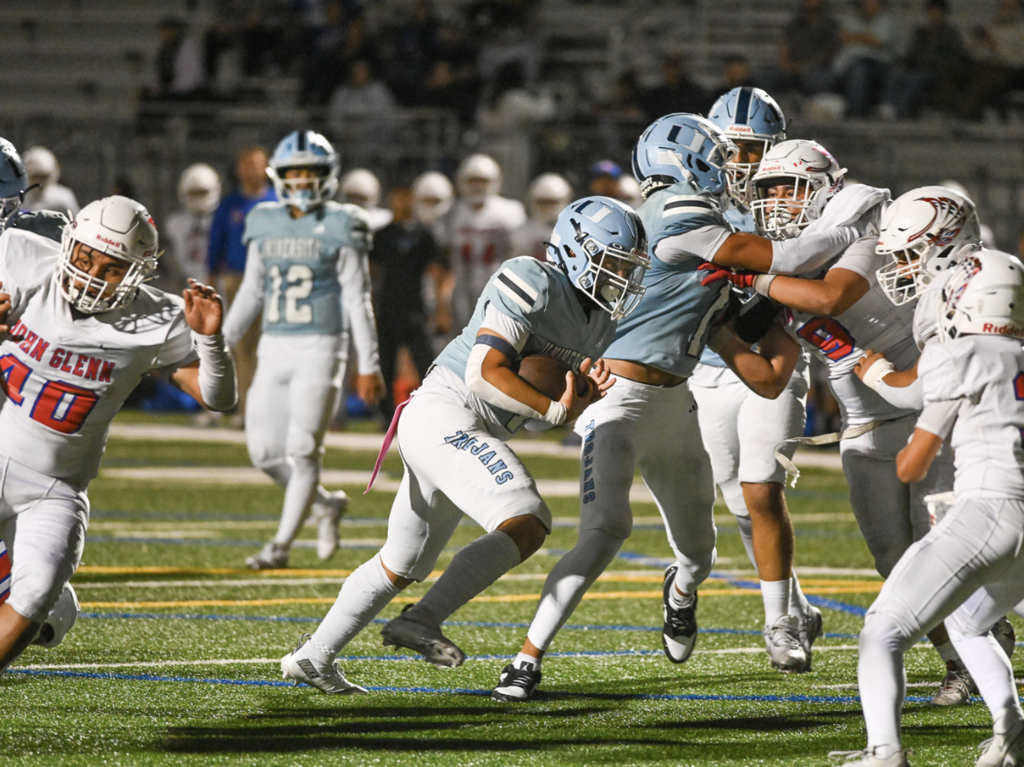 Senior #7 Zion Barretto takes the carry in for his first career TD for the Trojans in victory.  For more great photos, visit: https://unifootballboosters.smugmug.com/20252026-UNI-TROJANS-FOOTBALL/Varsity