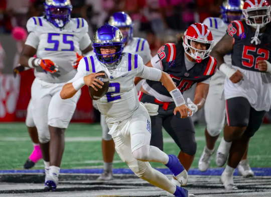 Santa Margarita quarterback Trace Johnson scrambles away from Mater Dei defenders to gain yardage in Santa Ana on Friday, Oct. 10, 2025. (Photo by Paul Rodriguez, Contributing Photographer, OC Register)