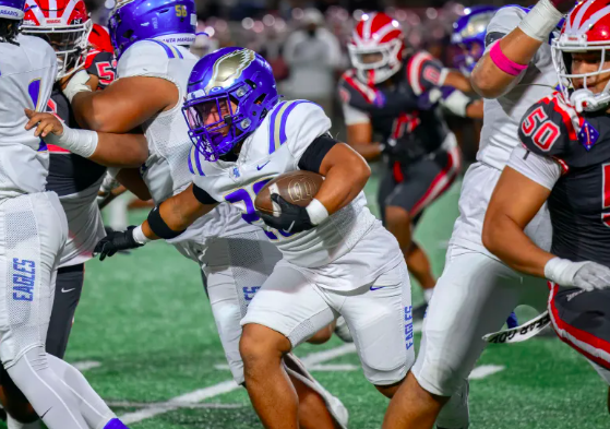 Santa Margarita running back Adrian Petero takes the ball past the Mater Dei defense in Santa Ana on Friday, Oct. 10, 2025. (Photo by Paul Rodriguez, Contributing Photographer, OC Register)