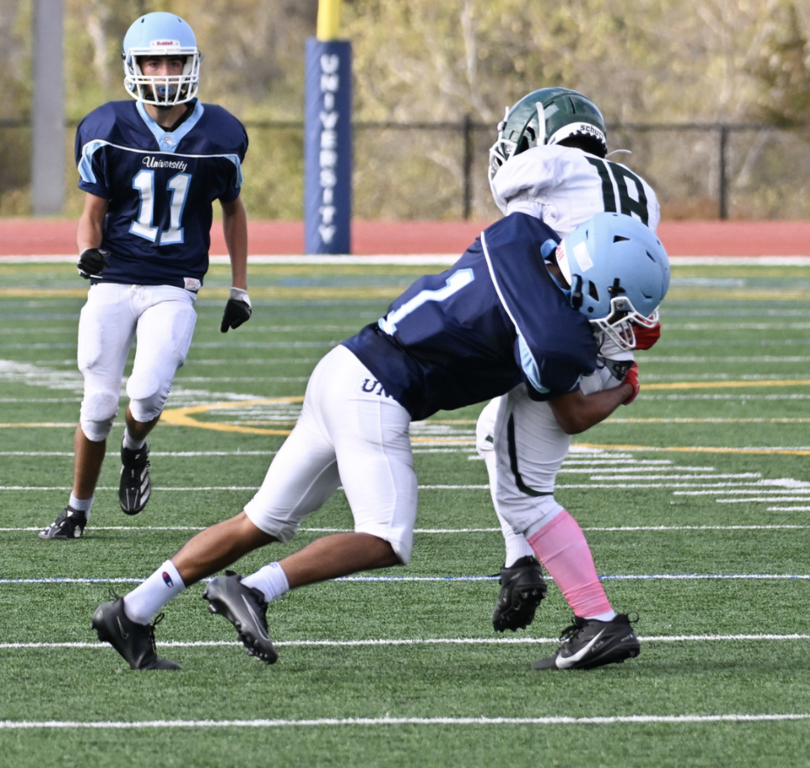 #1 Frosh Muqtader Ahmadi gets the textbook tackle for the Trojans against Buena Park.  For more photos visit:  https://unifootballboosters.smugmug.com/20252026-UNI-TROJANS-FOOTBALL/2025FROSH