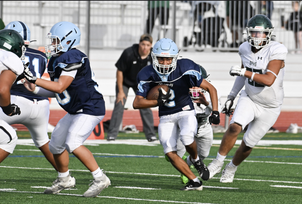 Frosh #2 Mujtahed Ahmadi with a big run for the Trojans.  For more photos visit:  https://unifootballboosters.smugmug.com/20252026-UNI-TROJANS-FOOTBALL/2025FROSH