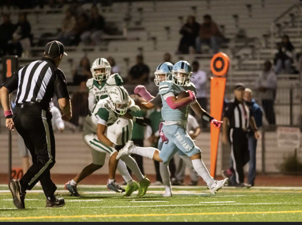 #7 Running Back Senior Zion Barreto had a career game and a spark for the Trojans rushing for 95 yards and a touchdown in the 10-2 victory over Buena Park.  For more great photos of this game and season visit: https://unifootballboosters.smugmug.com/20252
