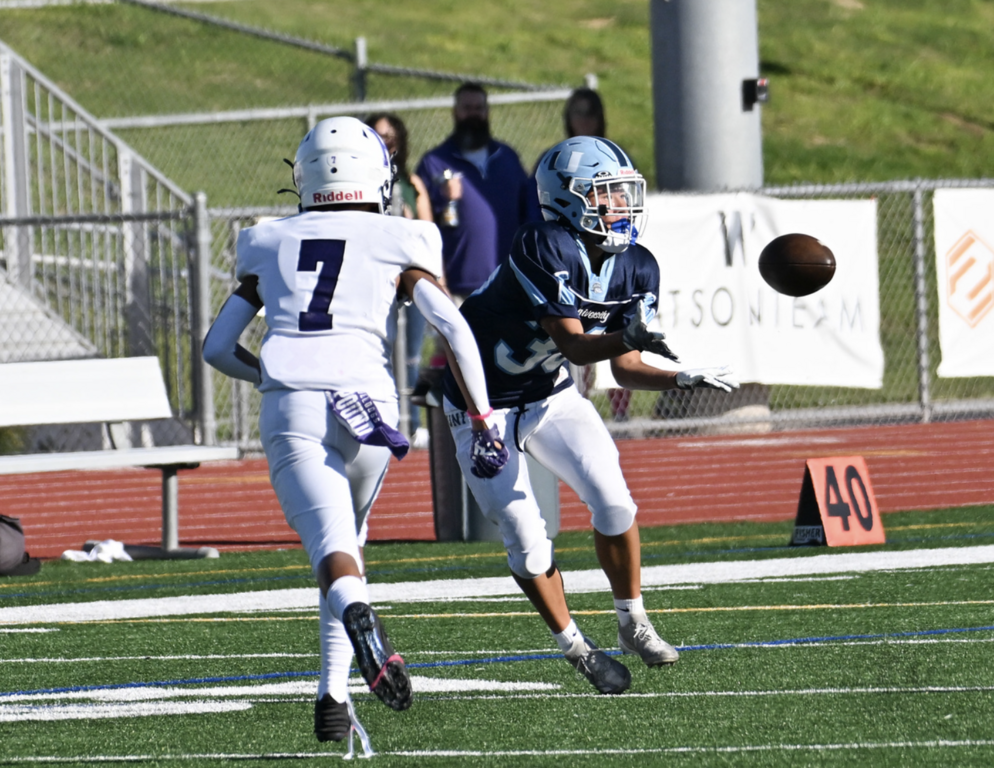 Frosh #30 Chase Heale reaches out to catch the ball.  For more photos, visit: https://unifootballboosters.smugmug.com/20252026-UNI-TROJANS-FOOTBALL/2025FROSH