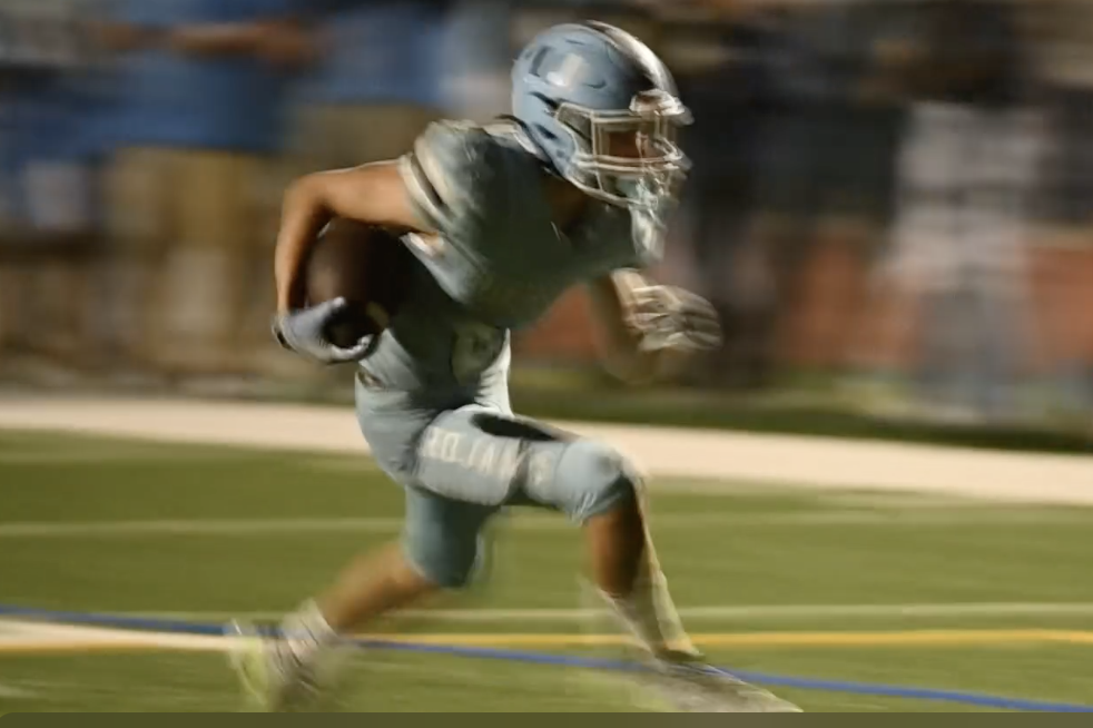 #21 Senior Wide Receiver Cruz McMullens was a blur all season long for opposing team breaking into the record books becoming the All-Time Single Season Leader with 930 receiving yards.  For more great photos of this game and season visit: https://unifootb