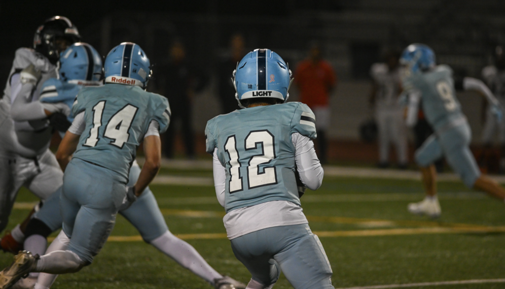 QB Dylan Elmer finished the season second in league passing yards with 1,666.  For more great photos of this game and season visit: https://unifootballboosters.smugmug.com/20252026-UNI-TROJANS-FOOTBALL/Varsity