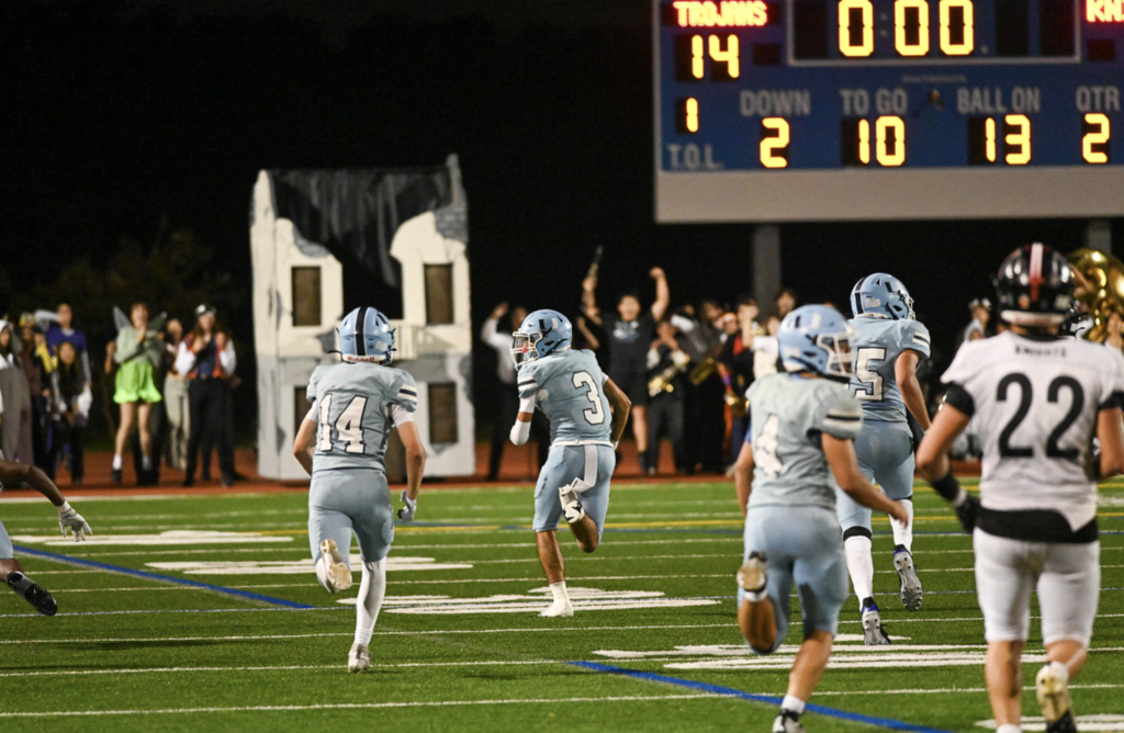 #3 Senior Joey "The Jet" Davis got to show off his blazing speed in his final game as a Trojan grabbing an interception and sprinting the length of the field 89 yards for his first career touchdown.  For more great photos of this game and season visit: ht