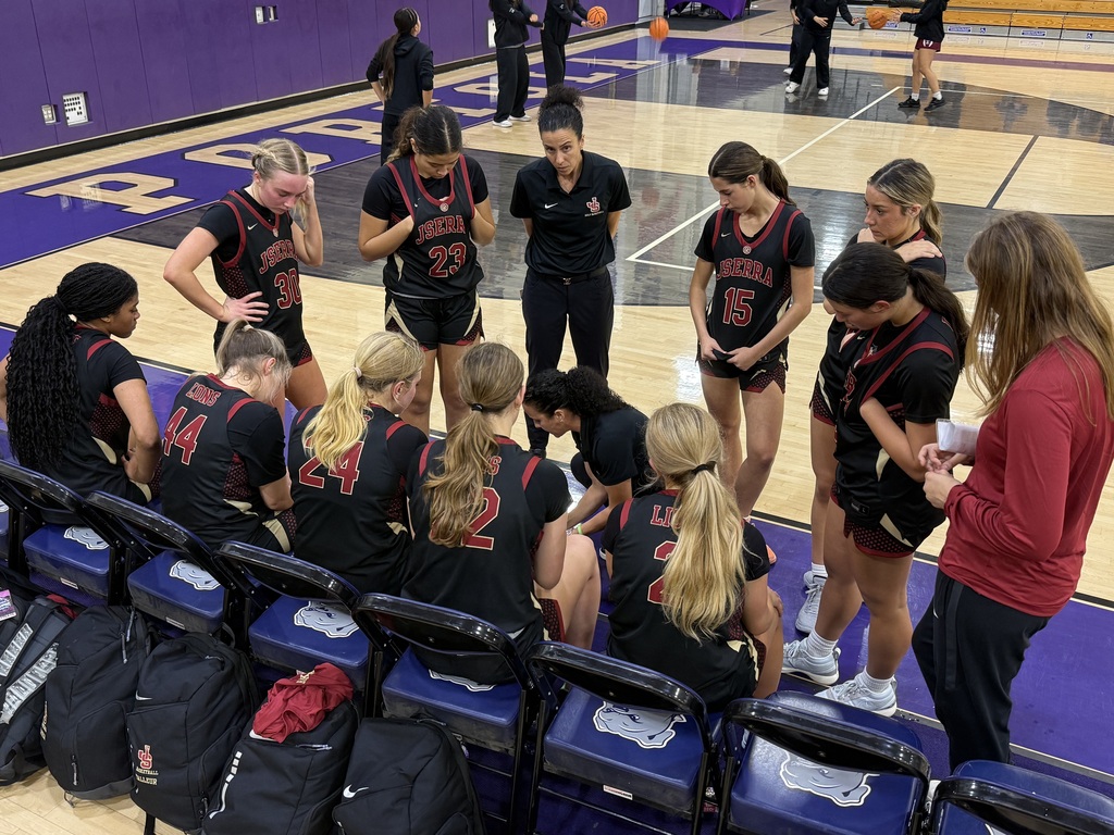 Coaches making halftime adjustments 
JSerra 26 El Dorado 17