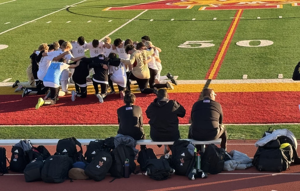 … and so it begins.  First pregame prayer.  Play hard and have fun boys!  Go Lions!