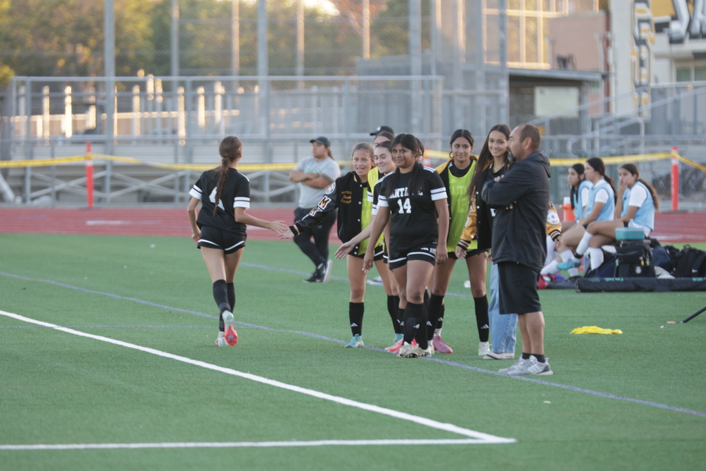 Sidelines after Isabel scores.