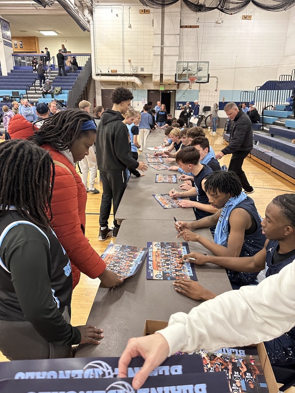 Youth Night poster signing after the game
