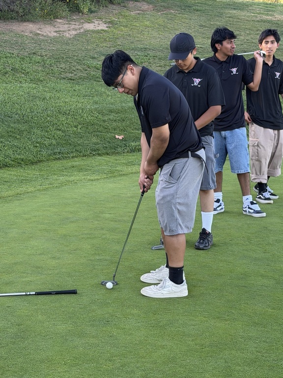 Guys getting work in on the green