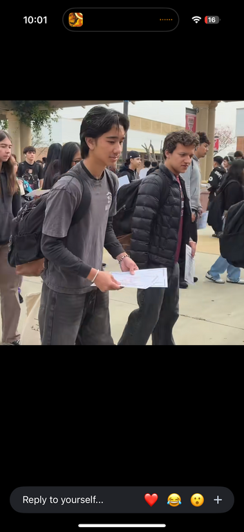 MUN Students Remy and Noah going to collect their perfect attendance awards