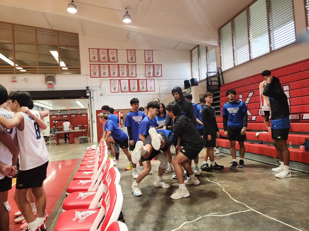 Varsity supporting JV in the 3rd Set.