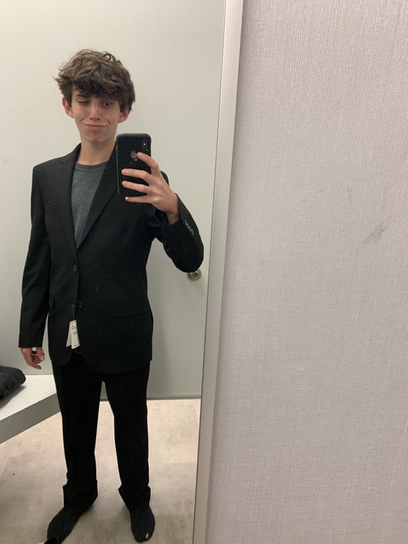 Trying on suit for confrence