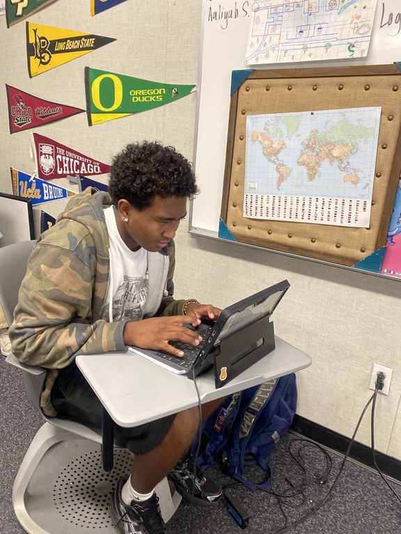 MUN student diligently working