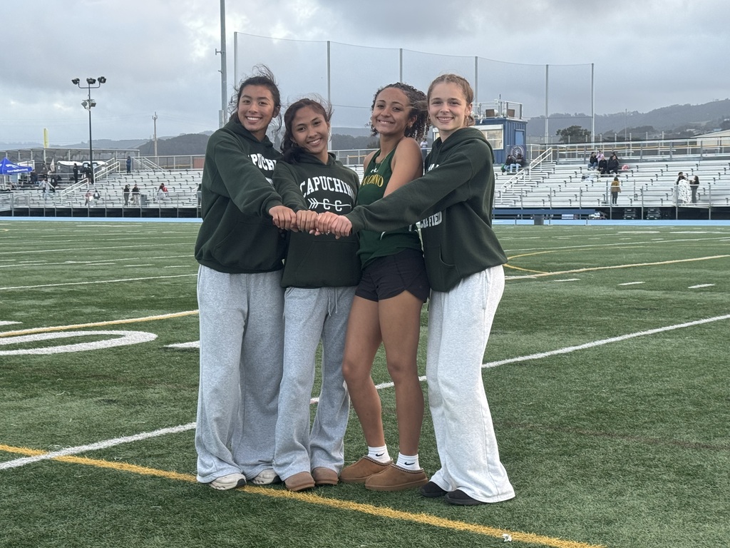 Women’s Varsity 4x400 finishing up an undefeated season
