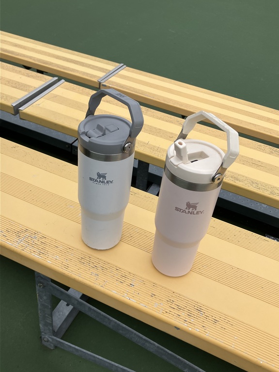 Water bottles left behind. Coach Greg put them in the shed.