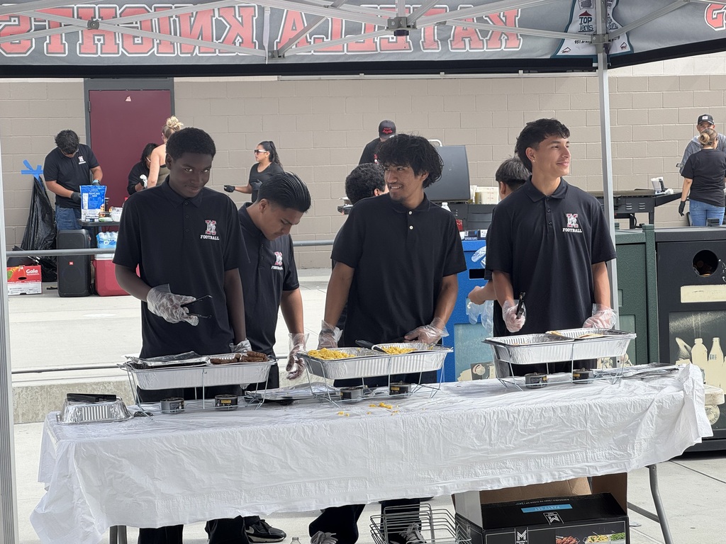 The boys are working hard serving breakfast for the fundraiser!