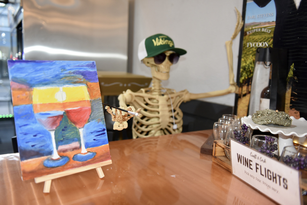 MR. SKELETON WITH ONE OF THE PAINTING . GREAT JOB VERY ONE .